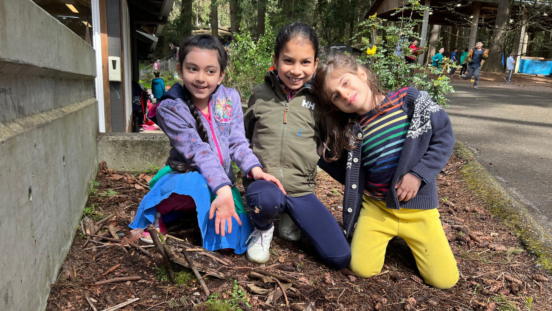 Students planting in garden